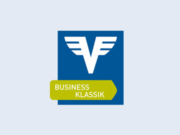 Business Klassik Konto Logo in Blau und Grün auf hellblauem Hintergrund.